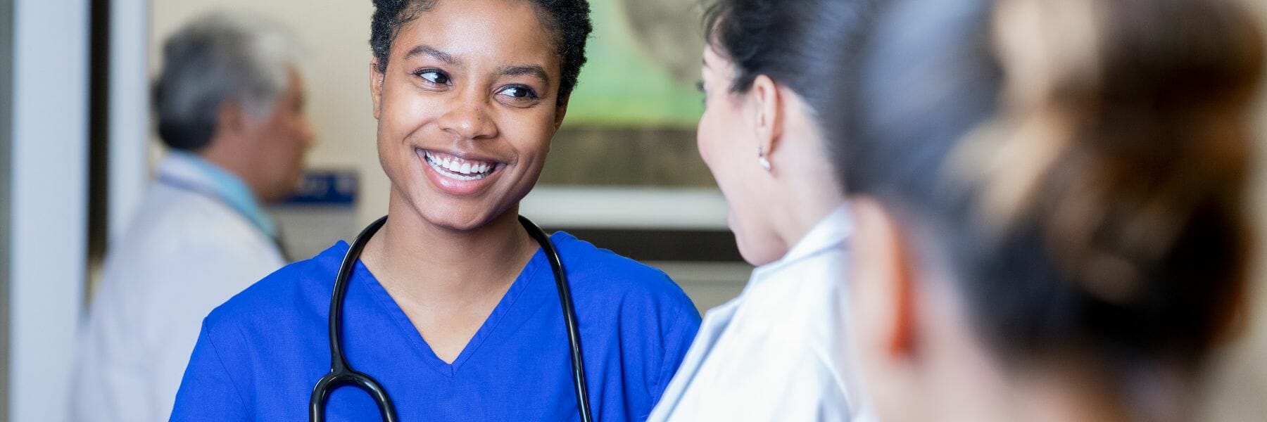 Image showing RN talking with a doctor.