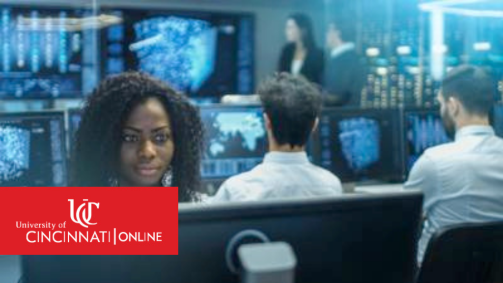 Cyber security analyst at a computer