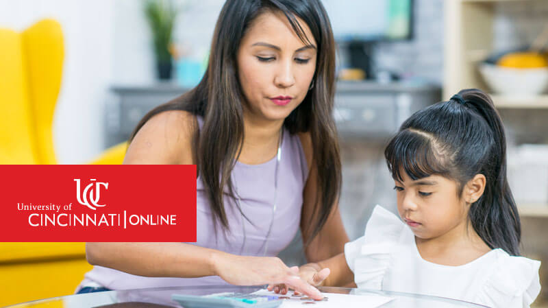 Behavior analyst teaching child