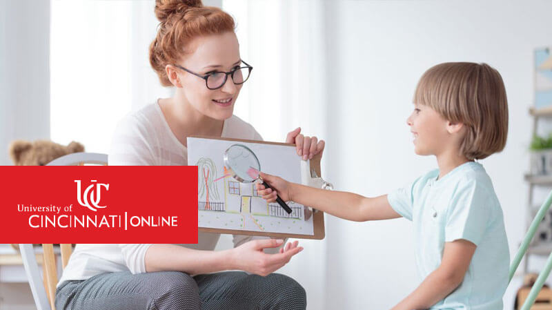 Applied Behavior Analyst working with student