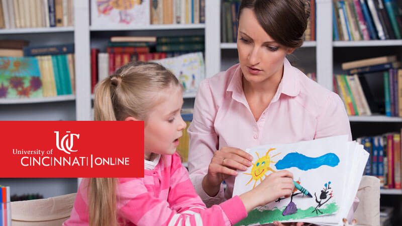 Behavior Analyst working with autistic child