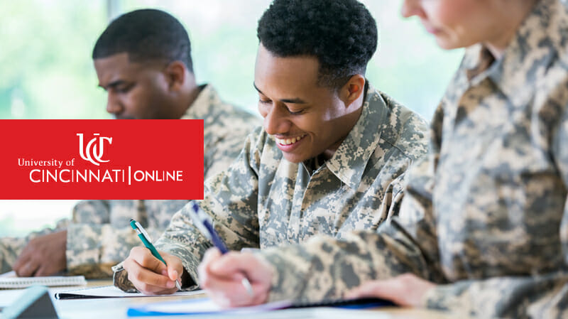 Military members writing on paper
