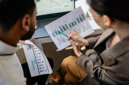 Business Analyst Reviewing Charts