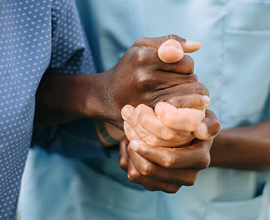 two people holding hands