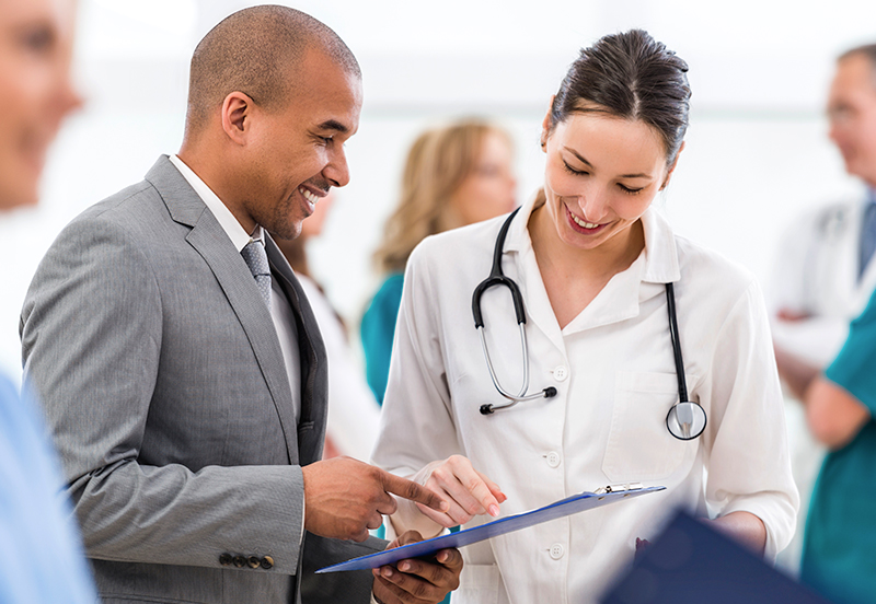 Healthcare workers looking at paperwork