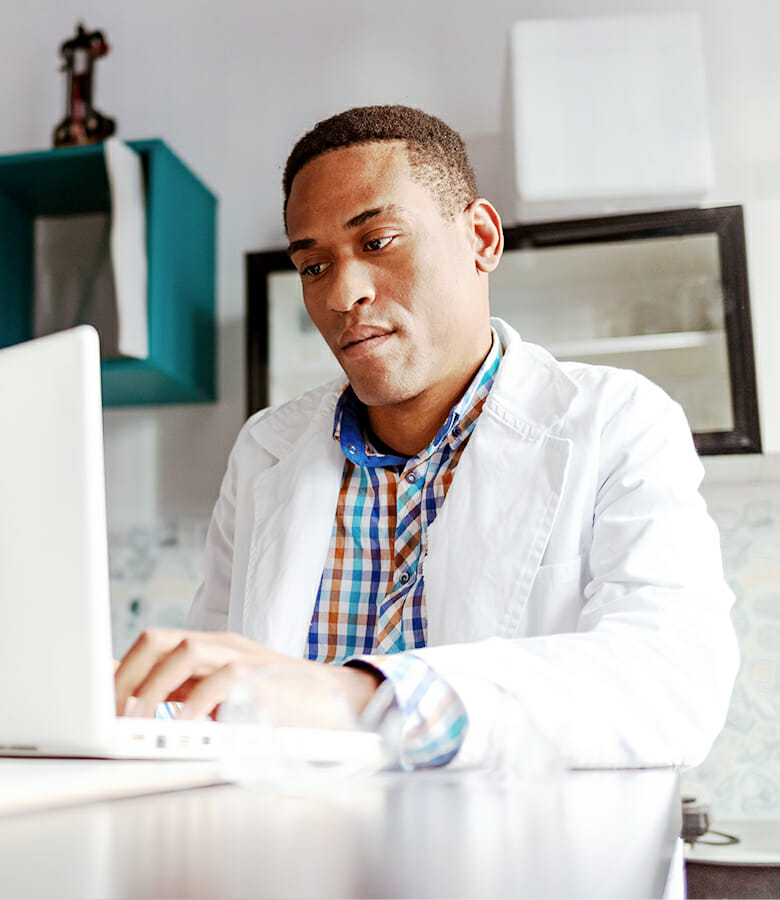 pharmacy student on laptop