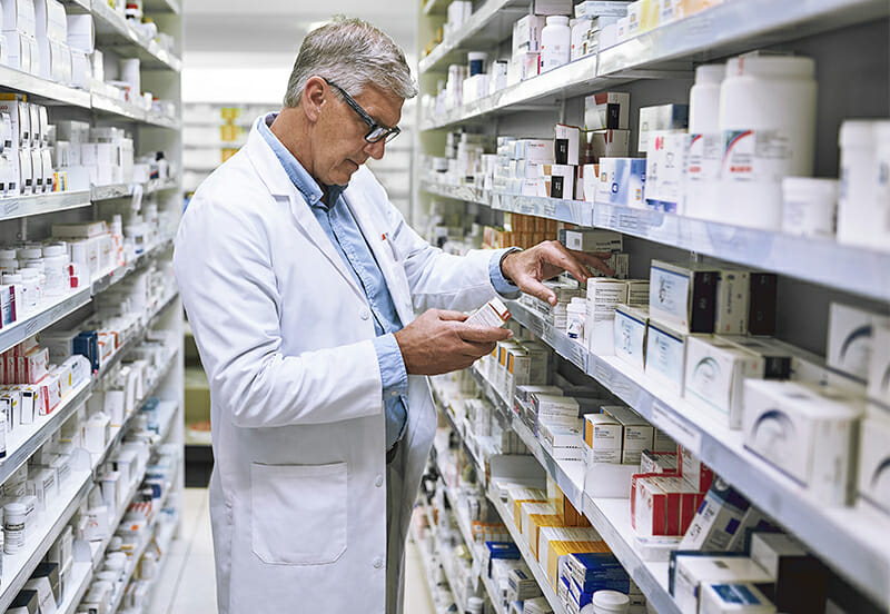 Man picking out medication