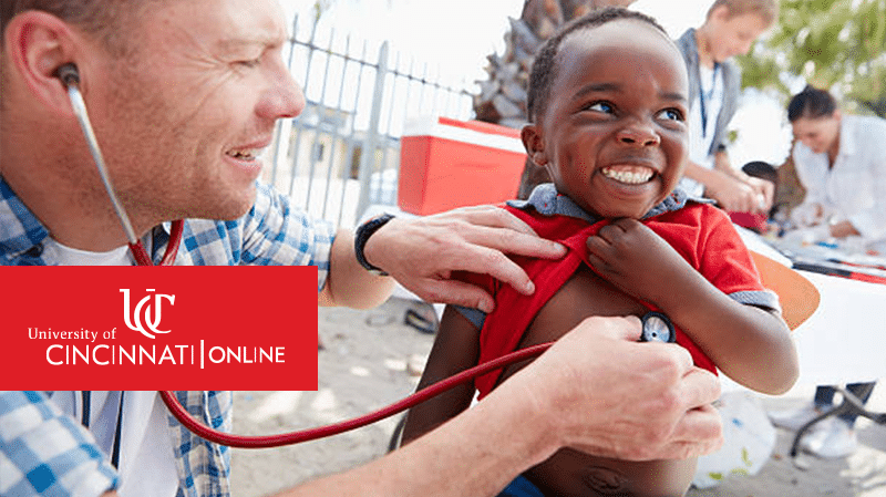 public health volunteer listening to kid's heartbeat