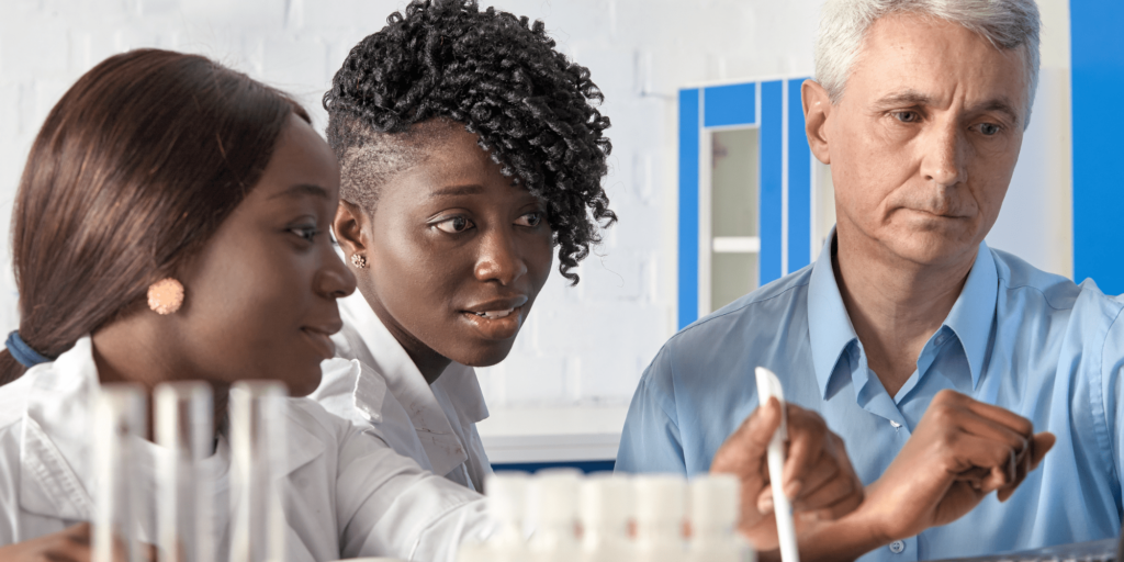 doctors looking at medical equipment