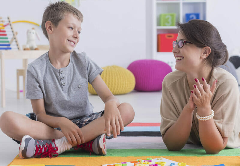 behavior analyst working with student