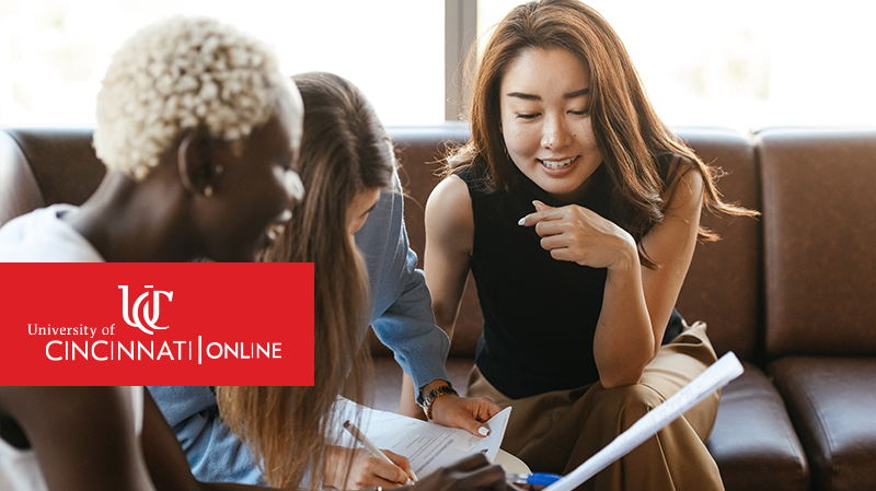 Three Woman Working in Business Discussing Management
