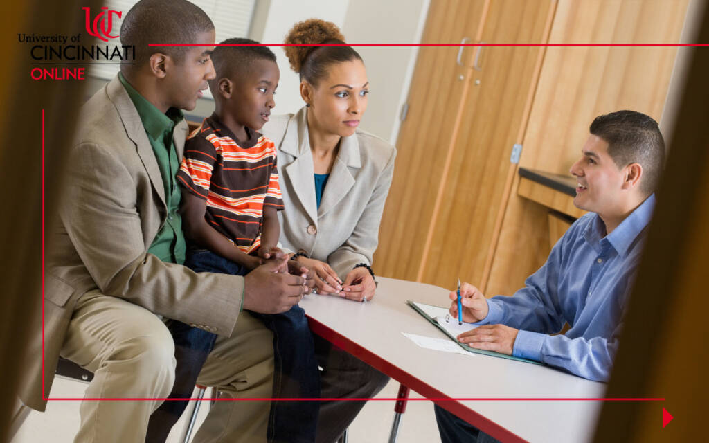 Principal at work, communicating to a family