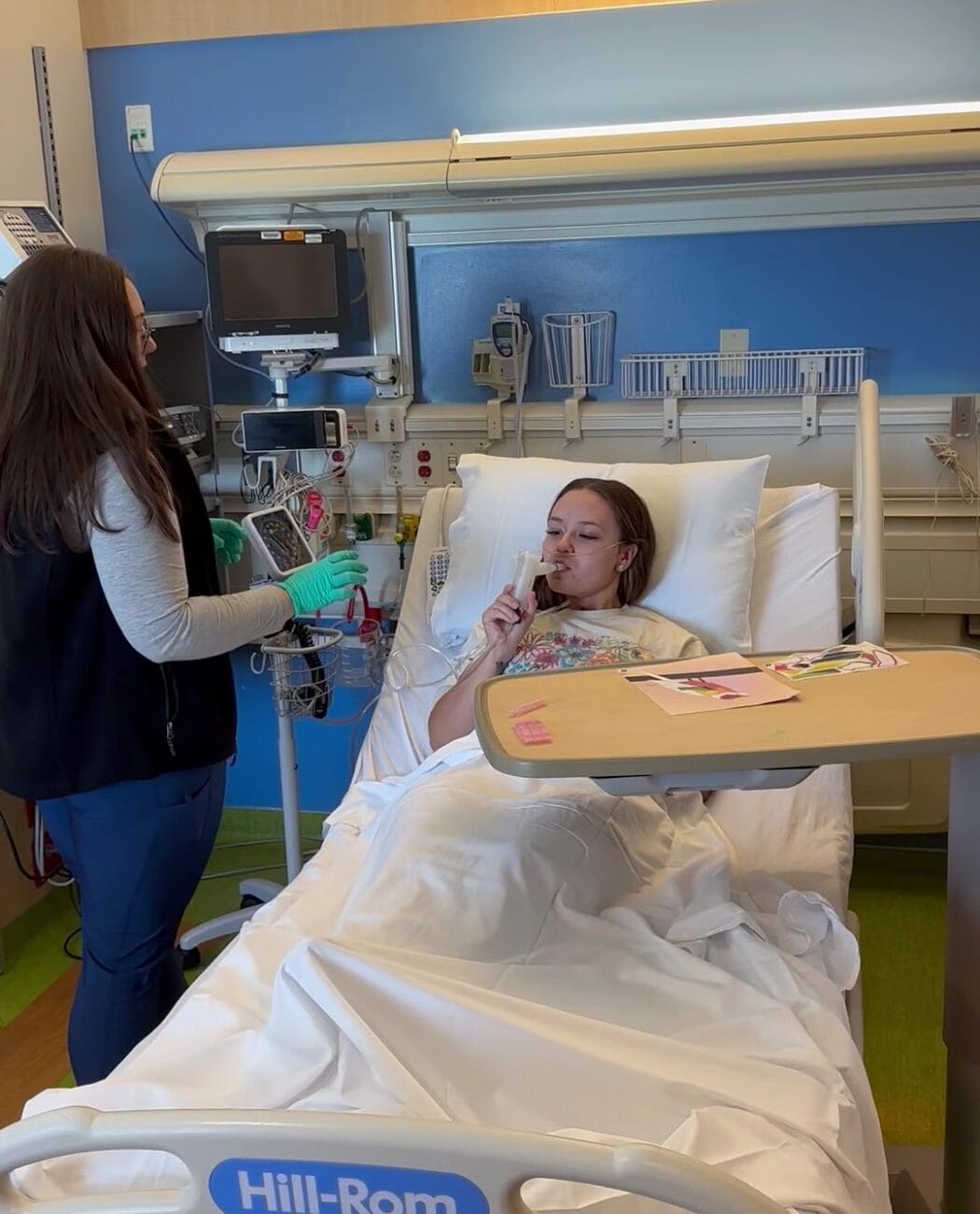 RT performing an oral pulmonary exam.