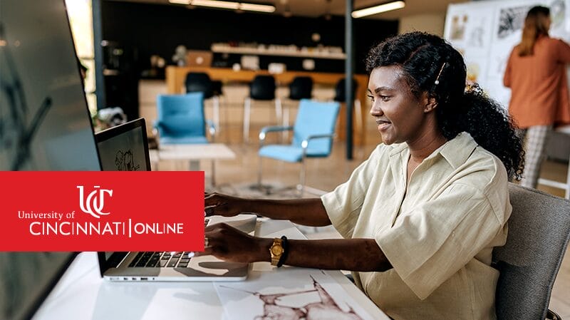Master's in Information Technology graduate at work