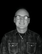 A black and white portrait photo of Rainer vom Hofe.